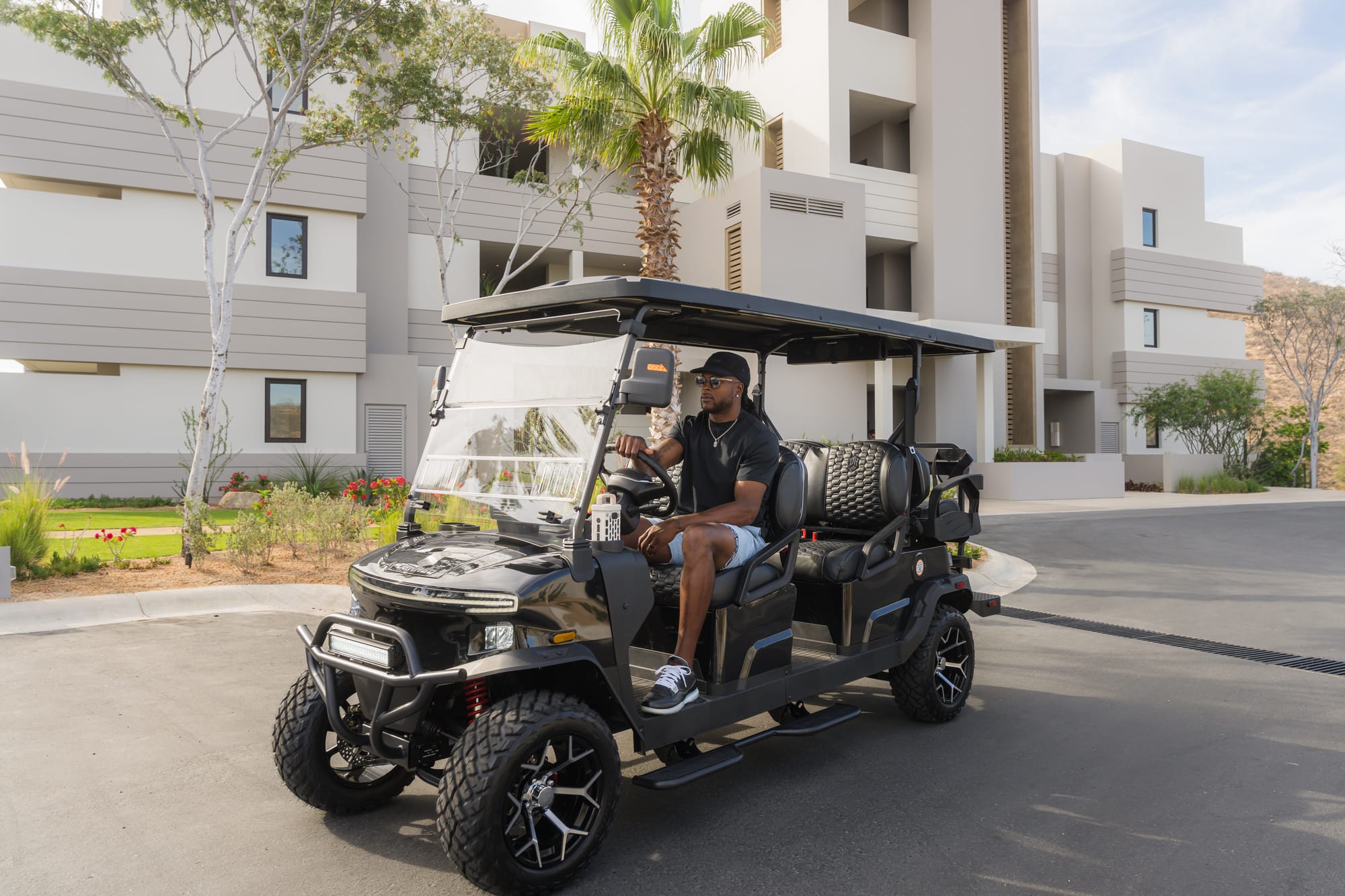 Davante Adams sitting in his Denago Rover XL6